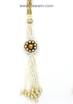 back splash - latkan dori with white beads - tassel for necklaces
  now show off not just your necklace but your back too .. back splash
  length of the dori is adjustable upto : 24.00 inches
  this item is not made of gold
  this item does not have any gold in it.
  use this dori - tassel to attach it to any necklace.

introducing the stunning back splash - latkan dori with beads - tassel for necklaces, brought to you by totaram jewelers. elevate your style and make a statement not just with yo Cheap Gold Necklace With Latkans, 22k Gold Jewelry, India Gift, Gold Jewelry Indian, Beaded Tassels, Online Jewelry Store, White Beads, 22k Gold, Your Back