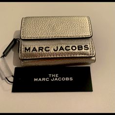 Folding Wallet Small Wallet From Marc Jacobs, Unisex, Plain, Logo, Folding Wallet, Small Leather Wallet. Designer Silver Wallet With Card Slots, Marc Jacobs Keychain Wallet, Brown Wallets With Card Slots For On-the-go, Small Leather Wallet, Fold Wallet, Marc Jacobs Bag, Small Wallet, Logo Color, Marc Jacobs