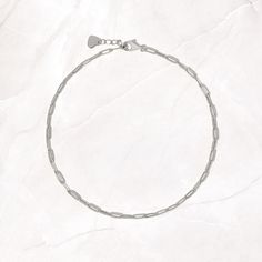 Cute and dainty paperclip chain anklet. Perfect for a minimalist and casual look, or stacked with another anklet. Made of 925 Sterling Silver We use a THICK plating of 14k Gold or Rhodium Available in 9" or 10" + .5" Extension Chain Nickel-Free and Hypoallergenic Lobster Clasp Closure Delicate Everyday Paperclip Bracelet, Minimalist Sterling Silver Anklet With Adjustable Chain, Silver Minimalist Anklets For Everyday, Everyday Minimalist Paperclip Bracelet With Lobster Clasp, Dainty Hypoallergenic Anklets For Everyday Use, Minimalist Hypoallergenic Sterling Silver Anklets, Dainty Hypoallergenic Everyday Anklets, Dainty Silver Adjustable Paperclip Bracelet, Silver Paperclip Bracelet With Delicate Chain