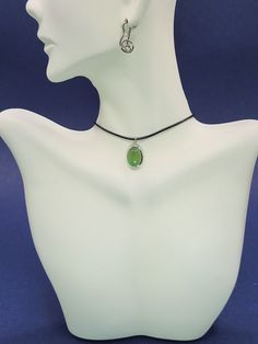 A silver pendant with chrysoprase on a black cord is not just a decoration; This is a powerful talisman that carries the power to energetically protect its owner. Chrysoprase, with its vibrant green hue, is more than just a stunning look. This gemstone is known for its healing properties, which are known to induce feelings of grace and balance. Set in silver, a metal with cleansing properties, it enhances the protective energy of the stone. Wearing this pendant creates a subtle shield around you Positive Communication, Silver Y2k, Protective Energy, Necklace Y2k, Y2k Necklace, Protection Amulet, Chakra Necklace, Pendant Choker, Emotional Balance