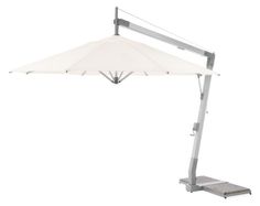 a white umbrella sitting on top of a metal stand