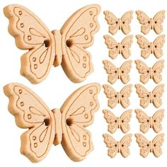 wooden butterfly shapes are shown on a white background