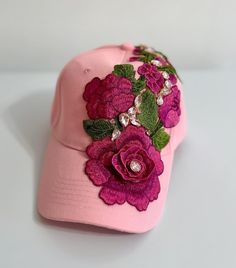 A beautiful pink cap embellished with an embroidered flower and rhinestones. Great to add some bling to any outfit or to gift. Hair Dues, Bling Hat, Vacation Hat, Custom Made Hats, Random Products, Head Coverings, Hat Patterns To Sew, Mad Hatters, Painted Hats