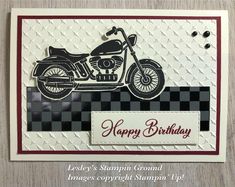 a happy birthday card with a motorcycle on the front, and checkered background in black and white