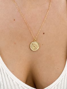 "Gold Sun Necklace, Coin Necklace, gold necklace, layering necklace, sun necklace, gold coin necklace, medallion necklace, dainty gold jewelry, minimal jewelry ♥Beautiful and delicate sun medallion gold disc necklace ♥Wear this necklace alone or layer it with your favorites. ♥A delicate 14k gold filled chain, with a hint of shimmer adorned with a gold filled disc pendant ♥Pendant measures 18mm x 22mm - about the size of a penny ♥LENGTH - The moon necklace shown on the model is 18\" long. Please Dainty Sun Design Jewelry For Everyday, Dainty Sun Design Jewelry For Everyday Wear, Dainty Everyday Sun Design Jewelry, Dainty Sun And Moon Design Charm Necklaces, Gold Charm Necklace With Sun Design, Gold Necklace With Sun Design Round Pendant, Dainty Sun And Moon Design Charm Necklaces For Everyday, Gold Plated Sun Design Necklace As Gift, Gold Sun Design Round Pendant Necklace