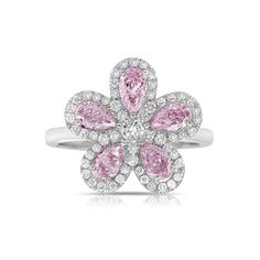 Delicate and gorgeous natural light pink-purple pear shape flower ring set in platinum with less than half a carat of white diamonds 1.09ct of natural light pink pears Pink Diamond Flower Shaped Ring, Pink Diamond Flower-shaped Ring, Pink Pear-shaped Diamond Ring With Halo Setting, Pink Pear-shaped Halo Diamond Ring, Pink Pear-shaped Ring With Rose Cut Diamonds, Pink Pear-shaped Rose Cut Diamond Rings, Sapphire Anniversary Ring, Pear Shapes, Sapphire Anniversary