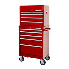 a red tool cabinet with two drawers on wheels