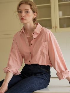 Cut from crisp cotton fabric, this relaxed fit shirt features casual open collars and buttoned front design. Wear yours alone, or layer with various items throughout the seasons.  - Intended for a loose fit- Comfortable dropped shoulders- Logo embroidery detail at cuff- Rounded hem design- Casual seam detail and chest pocket Everyday Pink Button-up Shirt, Pink Cotton Shirt With Pockets, Classic Pink Tops With Pockets, Classic Pink Top With Pockets, Pink Collared Shirt For Daywear, Pink Relaxed Fit Button-up Shirt, Oversized Pink Blouse With Pockets, Pink Collared Shirt With Pockets, Pink Button-closure Shirt For Everyday