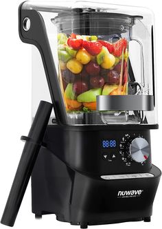 a blender filled with lots of different types of fruit