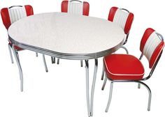 a white table with red chairs around it