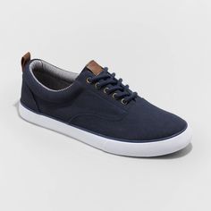 From casual office days to running errands to hanging out with friends, take on any occasion in cool style with these Brady Apparel Sneakers from Goodfellow and Co?. These medium-width shoes features a textured upper with crisp white outsoles to add texture and on-trend flair to any outfit you pair them with. Plus, the lace-up detailing gives you a comfy fit as you move through your busy day. Keep it casual with jeans and a henley, or dress it up with chino shorts and a button-down for easy warm Fall Season Low-top Canvas Shoes, Blue Casual Sneakers For Walking, Casual Blue Sneakers For Walking, Casual Lace-up Canvas Shoes With Cushioned Footbed, Casual Navy Sneakers With Branded Insole, Casual Navy Sneakers With Rubber Sole, Navy Canvas Casual Sneakers, Navy Casual Canvas Sneakers, Casual Navy Canvas Sneakers