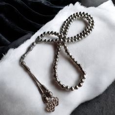 This unique rosary is handmade and all beads are stainless metal. The harmony between the gorgeous gold color and the carved lines of the beads is mesmerizing. It is also known by different names such as misbaha, prayer beads, tasbeeh, chapelet, dhikr beads, misbah, sibha, stress beads. This islamic tasbih is a great muslim gift idea. Tassel material is also stainless metal. PRODUCT DETAILS Weight: 140gr  Grain Length: 7.5mm (0.29") Grain Width: 7.5mm (0.29") Total Length: 51cm (20.07") All our Silver Rosary With Round Beads For Meditation, Adjustable Silver Rosary For Meditation, Polished Round Beads Rosary As Gift, Round Polished Bead Rosary As Gift, Silver Beaded Rosary For Meditation, Spiritual Silver 8mm Beads, Polished Round Beads Rosary For Jewelry Making, Spiritual Round Beads Rosary For Jewelry Making, Spiritual Silver Beads