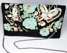 Hand Beaded to Perfection Stunning inlay, perfect for a crossbody or just an every clutch Multicolor Clutch For Evening In Spring, Spring Party Beaded Clutch, Beaded Crossbody Clutch, Spring Party Crossbody Clutch, Embellished Clutch For Summer Evenings, Multicolor Crossbody Clutch For Evening, Handmade Clutch For Spring Party, Spring Embellished Shoulder Bag For Evening, Handmade Spring Party Clutch