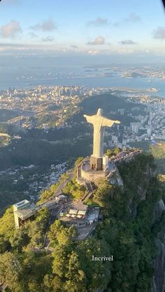 an aerial view of the statue of christ on top of a mountain in rio, brazil