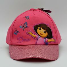 Item:  Nickelodeon Dora the Explorer Adjustable Toddler Hat Cap Pink Bling Butterflies Brand:  Nickelodeon Character:  Dora from Dora the Explorer Size: Children's One Size - Hook & Loop Adjustable Strap Style:  Baseball Style Cap Hat  Manufacturer:  Viacom International, Inc. Measurements:  Circumference Adjustable Strap Should Fit any Toddler;  Bill Width 2 1/2 Inches;  Bill Seam to Crown 6 Inches Special Features:  Sequins on Bill and Glitter on Butterflies Country of Manufacture: China Condi Adjustable Short Brim Baseball Cap For Gift, Adjustable Short Brim Baseball Cap As Gift, Themed Adjustable Baseball Cap, Adjustable Themed Cap Style Hat, Adjustable Themed Cap, Themed Adjustable Cap, Adjustable Themed Hat As A Gift, Adjustable Themed Hat As Gift, Toddler Hat