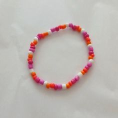 Lesbian Clay Bead Bracelet, Pink And Orange Bracelet, Cute Seed Bead Ideas, Lesbian Beaded Bracelet, Bracelet Seed Beads Ideas, Inside Out Bracelets, Orange Beaded Bracelets, Lesbian Flag Bracelet, Bracelet Ideas Seed Beads