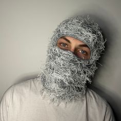 Introducing our Distressed Balaclava Ski Mask, a versatile winter essential with a fluffy twist!  HandCrafted from soft knitted material, this balaclava offers cozy warmth while adding a touch of flair to your cold-weather look. Inspired by trending rapper aesthetics, its distinctive distressed design sets you apart on the slopes or the streets. Wear it as a classic balaclava for full-face coverage, or fold it up to wear as a stylish toque. Whether you're hitting the slopes for some snowboarding Distressed Balaclava, Balaclava Ski Mask, Bunny Mask, Fun Hat, Camouflage Hat, Knitted Balaclava, Ski Mask, Cool Hats, Winter Essentials