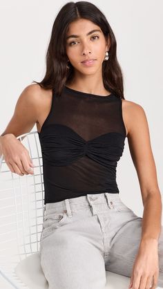 Reformation Rose Knit Top | Shopbop Fitted Seamless Nylon Tops, Seamless Fitted Nylon Tops, Black Stretch Polyamide Tops, Fitted Versatile Nylon Tops, Nylon Tops With Built-in Bra, Black Nylon Tops For Fall, Black Nylon Top For Night Out, Chic Sleeveless Nylon Top, Chic Black Top With Seamless Collar