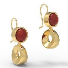 Our Flavia earrings are bold and stylish, with beautiful red garnet stone set into a round bezel, below which hangs a striking and solid wedge-shaped geometric ring. These earrings are based on an example found at Pompeii, from the first century AD. They feature the Roman hook at the back, but are also available with a post back. "Flavia" was the name of an important plebeian family, or gens, in ancient Rome. Over time, its members held such important posts as Tribune of the Plebs (fourth centur Modern Sterling Silver Earrings With Cabochon, Modern Oval Cabochon Earrings, Modern Gold Earrings With Bezel Setting, Elegant Red Earrings With Polished Finish, Modern Red Ruby Jewelry, Modern Cabochon Earrings For Gifts, Modern Cabochon Earrings Gift, Red Round Earrings With Polished Finish, Modern Garnet Jewelry For Anniversary