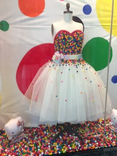 a dress made out of sprinkles on display