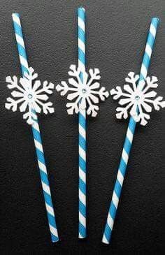 three blue and white straws with snowflakes on them