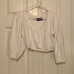 Urban Outfitters White 3/4 Sleeve Crop Top. The Sleeves Have A Lace Edge Which Is Super Cute. Also Bell Shoulders Which I Absolutely Love. Never Worn! Cotton Tops With 3/4 Sleeves For Day Out, Urban Outfitters Cotton Long Sleeve Top, Fall Daywear Top With Half Sleeves, Long Sleeve Cotton Crop Top For Day Out, Half Sleeve Tops For Fall Day Out, Cropped Cotton Long Sleeve Top For Spring, Fitted Half Sleeve Tops For Day Out, Fitted Tops With 3/4 Sleeves For Day Out, Urban Outfitters Stretch Long Sleeve Crop Top