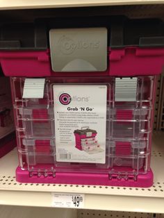 the pink bins are for sale on the shelf in the store's shelves