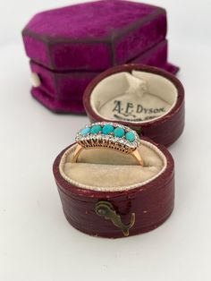 Welcome to Caviar and Cobwebs ! Thanks for stopping by. Enjoy browsing!  Here we have a lovely Edwardian turquoise and diamond saddle ring. Five oval shaped turquoise stones surrounded by old mine cut diamonds. Please note two diamonds have been replaced with rose cut Diamonds. Total of 0.20ctw   This ring is in a size 7. Stunning colour to the turquoise. Not marked, but tested.  Gift wrapped and shipped safe and secure from Canada. Box for display purposes only* Turquoise Diamond Ring, Turquoise Diamond Rings, Saddle Ring, Old Mine Cut Diamond, Turquoise Stones, Rose Cut Diamond, Turquoise Stone, Rose Cut, Rings Statement