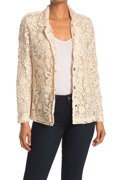 Perfect for your upcoming Zoom meetings, this tonal embroidered lace blazer jacket adds refined styling to your weekly rotation. Spread collar. Long sleeves. Front button closure. Tonal embroidered construction. Lined. Approx. 25" length. Imported Beige Long Sleeve Outerwear With Floral Embroidery, Fitted Cream Embroidered Outerwear, Crochet Blazer, Embroidered Long-sleeve Cotton Blazer, Lace Blazer Jacket, Smocked Blouse, Fitted Single-breasted Jacquard Blazer, Elegant Single-breasted Jacquard Blazer, Lace Blazer