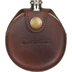 a brown leather flask case with the word barbour on it's side