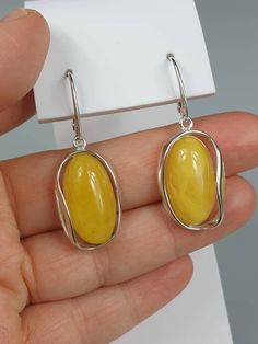 Big white Amber earrings - 1 pair.. Natural butterscotch Baltic Amber. Each pair can be slightly difderent colour due to amber is being natural. Handmade earrings. Sterling silver 925, with stamps. Earrings length about 4 cm. A matching pendant is also available. Earrings Hanging, Amber Earrings, Gift For Mother, Amber Jewelry, Baltic Amber, Earrings Sterling Silver, Jewelry Handmade, Handmade Earrings, Silver 925