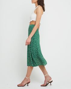 Price Comparison Few Moda $49 Alice + Olivia $440 Max Mara $125 Product Details Fun and fresh, this midi skirt is done in a sweet green print with a simple silhouette.- Back zipper- Lined- Content: 100% Polyester Style# K22WSK60008 Fit Notes - Model wearing a size S- Model measurements: Height: 5'10" Bust: 34" Waist: 24" Hips: 35" Bra Size Charts, Simple Silhouette, Price Comparison, Green Print, Green Skirt, Active Wear Tops, Max Mara, Alice Olivia, S Models