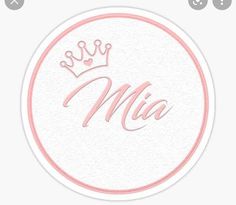 a white and pink sticker with the word mia on it's center circle