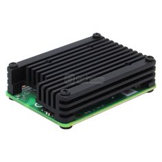 the back side of a black and green pci board with four ports on it