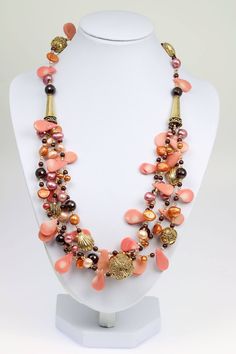 A parade of Garnet and Pink Coral Tear-drop beads comes together in this captivating necklace. Faceted Garnet beads add a sparkling dimension, while 24K Gold Vermeil beads lend a fanciful finish to the piece. Measures approximately 22 inches in length. Secures with a Vermeil Toggle Closure Gift Boxed. Czech Beads Jewelry, Summer Necklaces, Beaded Jewelry Necklaces, Carnelian Necklace, Garnet Necklace, Carnelian Beads, Coral Jewelry, Summer Necklace, Pink Coral