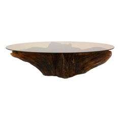 a wooden table with glass top on white background