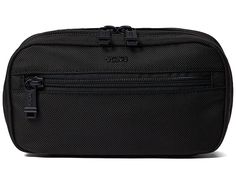 Tumi Zip-Around Case - Luggage : Black : Keep your essentials safe and organized in the Tumi Zip-Around Case. Ballistic nylon constriction. Zipper closure. Single hand carry strap. Pockets: One external zip pocket; One internal slip pocket. Comes in a box. Contains G-Hooks compatible w/ Alpha Bravo's daisy chain system. Ballistic nylon lining. Imported. Measurements: Width: 7 3 4 in Depth: 2 in Height: 4 1 2 in Weight: 6 oz Functional Cases With Zipper Closure For Daily Use, Functional Travel Accessories With Zipper Closure, Functional Case With Zipper Pocket For Storage, Functional Pouch Case With Zipper Closure, Modern Nylon Travel Accessories With Zipper Closure, Functional Pouch Cases With Zipper Pocket, Functional Pouch Case With Zipper Pocket, Modern Zipper Closure Storage Cases, Modern Pouch Case With Zipper Closure