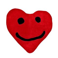 a red heart with a smiley face drawn on it's side and black eyes