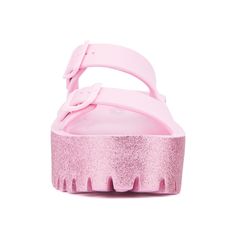 For effortless summer style from beach to boardwalk, slip into our Sparkles slide sandal. Its glitter finish adds a touch of illumination to the double-strap upper, complemented by a sturdy lug sole for comfort and traction. Perfect for casual outings or seaside adventures, the Sparkles sandal combines chic design with practicality, ensuring you shine brightly wherever you go this summer. Pink Slides With Textured Footbed, Pink Textured Footbed Slides, Pink Synthetic Platform Jelly Sandals, Pink Platform Jelly Sandals In Synthetic Material, Pink Platform Jelly Sandals In Synthetic, Pink Platform Jelly Sandals With Synthetic Material, Pink Platform Jelly Sandals For Beach, Pink Textured Footbed Sandals For Summer, Summer Pink Synthetic Slides