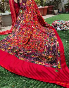 Product Item: Full Embroidery Work Dupatta  Size- Length> 86 Inch (2.25' Meter) Width >38 Inch Approx. Please share color choice after buying Fabric> Cotton Uses: (1)Traditional Wear: These dupattas can be paired with traditional Indian outfits like salwar kameez, anarkali suits, lehengas, and sarees. They add a touch of elegance and ethnicity to your attire. (2)Casual Wear: You can also wear these Phulkari dupattas with your everyday casual outfits like jeans and kurtis to give them a pop of color and style. (3)Festivals: These dupattas are perfect for festive occasions like Diwali, Holi, Eid, or other cultural celebrations. The intricate embroidery and mirror work can make you stand out during festivities. (4)Weddings and Special Occasions: They are great choices for attending weddings, Red Bohemian Dupatta For Traditional Ceremonies, Bohemian Semi-stitched Saree With Motifs, Bohemian Chanderi Blouse Piece For Traditional Ceremonies, Bohemian Blouse Piece With Pallu For Festivals, Folk Style Multicolor Embroidered Dupatta Shawl, Bohemian Shawl With Motifs For Diwali, Bohemian Shawl For Diwali Ceremonies, Bohemian Shawl For Diwali And Traditional Ceremonies, Multicolor Embroidered Folk Shawl Dupatta