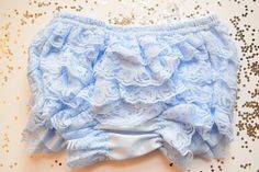 Baby Blue Vintage Look Lace Full Front and Back Ruffled Bloomer Full Front and Back bloomer with elegant lace ruffles. Adorable to wear under any dress, baby costume or for that perfect cake smash photoshoot! Choose your finish with No bow or Matching Bow. Bow Placement Location: Back Fitted Light Blue Bottoms With Ruffles, Blue Ruffled Bloomers For Summer, Summer Blue Ruffled Bloomers, Fitted Spring Bloomers With Ruffles, Baby Kostüm, Smash Cake Photoshoot, Baby Costumes, Look Vintage, Lace Ruffle