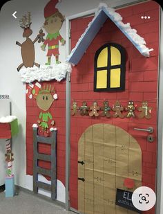 an office decorated for christmas with decorations on the door