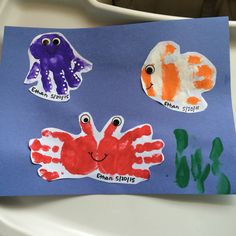 handprints made to look like animals and fish