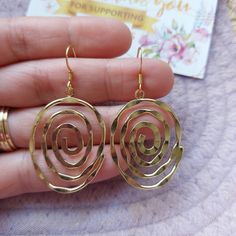 A beautiful earrings made of stainless steel earring hooks and zinc based Alloy pendant in spiral shape . It can be a gift for yourself or your loved ones on any occasion.  Care of jewellery  Keep it dry at all times.  No contact with water or any liquids.  Despatched within one day after placing your order, FREE DELIVERY WORLDWIDE. WHY YOU'LL LOVE ❤️ IT 😊 📌it's suitable to wear everyday. 📌using long lasting materials 📌handmade earrings for women made with attention to details  📌 a beautifu Gold Stainless Steel Earrings As Gift, Gold Stainless Steel Earrings For Gift, Rose Gold Brass Earrings For Gift, Gold Circle Earrings As Gift, Gold Circular Earrings As Gift, Gold Circular Earrings For Gift, Spiral Rose Gold Jewelry Gift, Metal Round Earrings For Gift, Brass Earrings For Gift