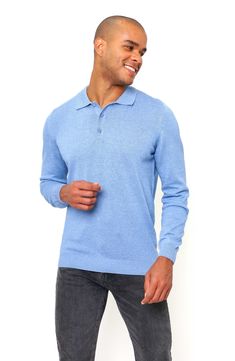 Crafted entirely from cotton, this long-sleeve polo is a comfortable option on cooler days. 25" length Spread collar Long sleeves 100% cotton Machine wash, dry flat Made in Turkey Model stats: 6'1" height, 32" waist. Blue Casual Polo Sweater With Polo Collar, Blue Casual Polo Sweater, Casual Blue Polo Shirt With Ribbed Collar, Blue Casual Polo Shirt With Ribbed Collar, Blue Polo Collar Sweater For Fall, Blue Polo Sweater For Fall, Fall Blue Cotton Polo Shirt, Blue Polo Collar Sweater For Winter, Solid Cotton Polo Sweater With Polo Collar