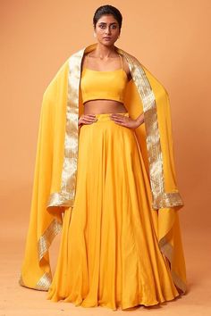 Mustard Yellow Plain Lehenga Set with Dupatta Featuring a Mustard Yellow  Plain l lehenga in satin organza base with Gota Patti. It is paired with a matching blouse, dupatta. This product will be shipped to you after 1-2 weeks from the date of order placed. Custom made orders are not returnable. NOTE: Visual Samples on website may differ slightly from actual product due to light & effects during photography (Length & Breadth have 1 n 1.5 inches +/-). NOTE : Before placing order ,pls confirm product n color availability on +91 7903893945 & +91 8447750028(WhatsApp) NOTE : For Wholesale Order MOQ is 5 Pieces of any color/Pattern contact on +91 7903893945 & +91 8447750028(WhatsApp) Lehenga Haldi, South Asian Wedding Dress, Plain Lehenga, Mehendi Night, Berry Dress, Dress Party Wear, Haldi Outfit, Yellow Lehenga, Asian Wedding Dress