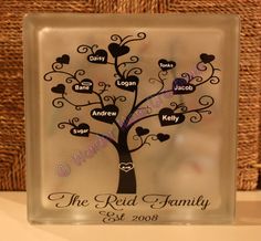 a glass block with a family tree on it