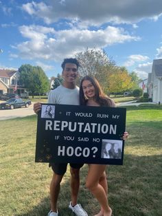 a man and woman holding a sign that says, it would ruin my repuptation if you said no hoco?