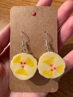 Adorable lightweight & durable plastic banana slice earrings. Length- 2.5cm Drop Length- 4.5cm Width- 2.5cm Banana Slice, Etsy Earrings Dangle, Daughter Love, Lollipop, Jewelry Earrings Dangle, Dangle Drop Earrings, Dangle Earrings, Handmade Items, Jewelry Earrings