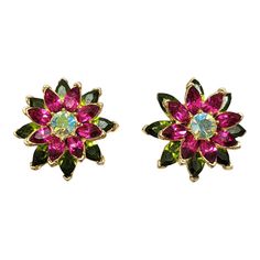 Circa 1961 goldtone marquise faux-peridot and faux-ruby with round green aurora borealis center flower clip earrings. Marked crown "TRIFARI©." Measure: 1 1/16 inches across. Excellent condition. Green Aurora Borealis, Green Aurora, Diamond Cluster Earrings, Crown Trifari, Art Deco Earrings, Flower Clip, Cluster Earrings, Accessories Jewelry Earrings, Modern Earrings